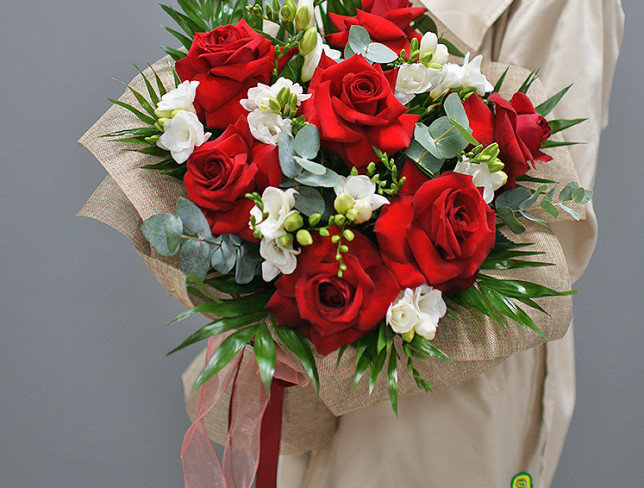 Bouquet of red roses and white freesias photo